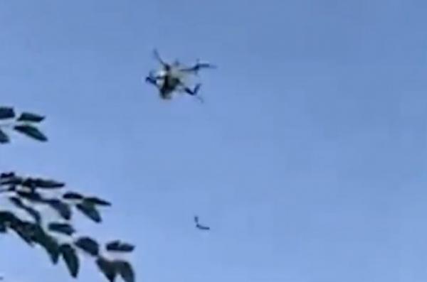 russian FPV Drone Approaches Ukrainian Fighter, Who Shoots It Down With Small Arms (Video)