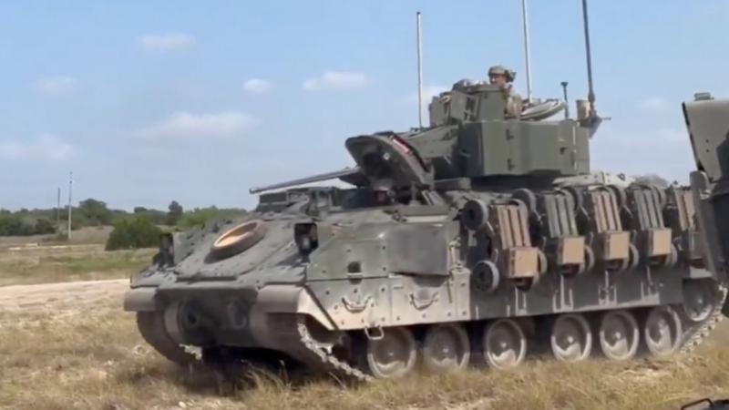 Five Ground Robots on One Bradley: U.S. Army Is Testing New Way to Deploy Drone Swarms
